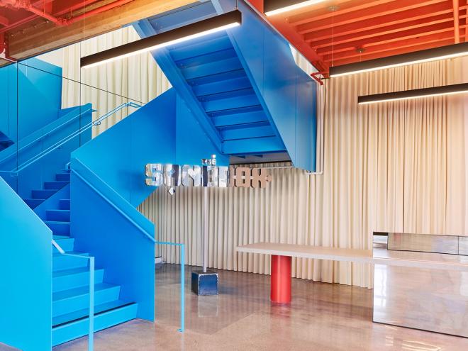 A blue staircase in the Sandbox office in LA