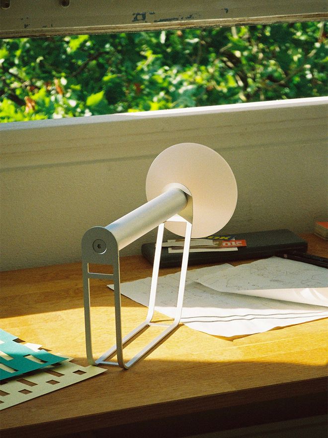 An image of Muuto's Piton table lamp as part of the home office decor.