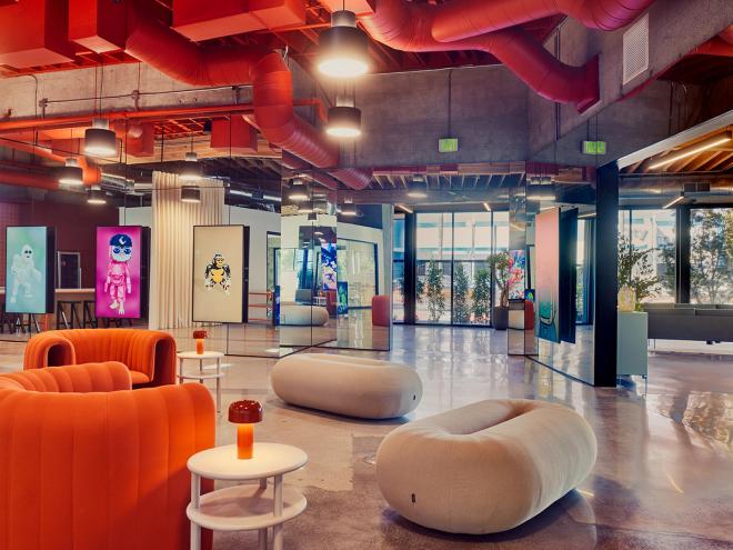 An industrial-style lounge area at The Sandbox headquarters in Los Angeles