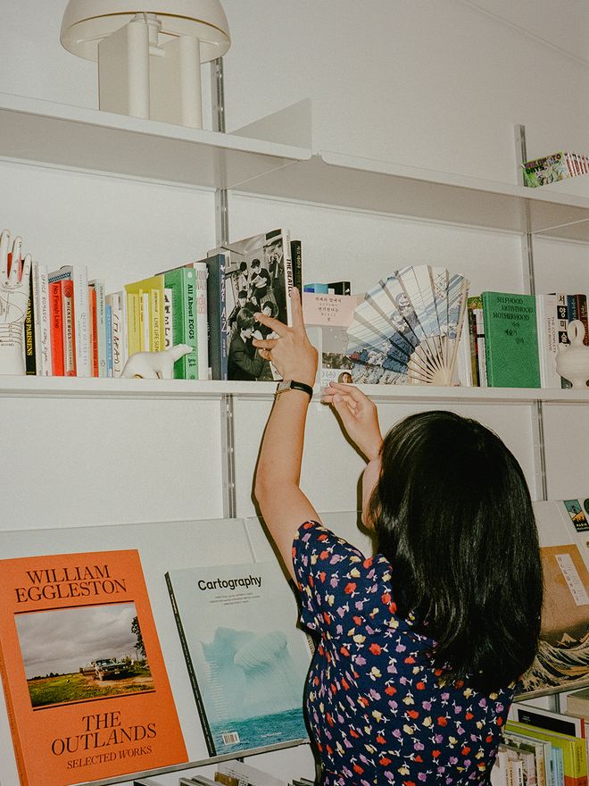 A woman browsing books