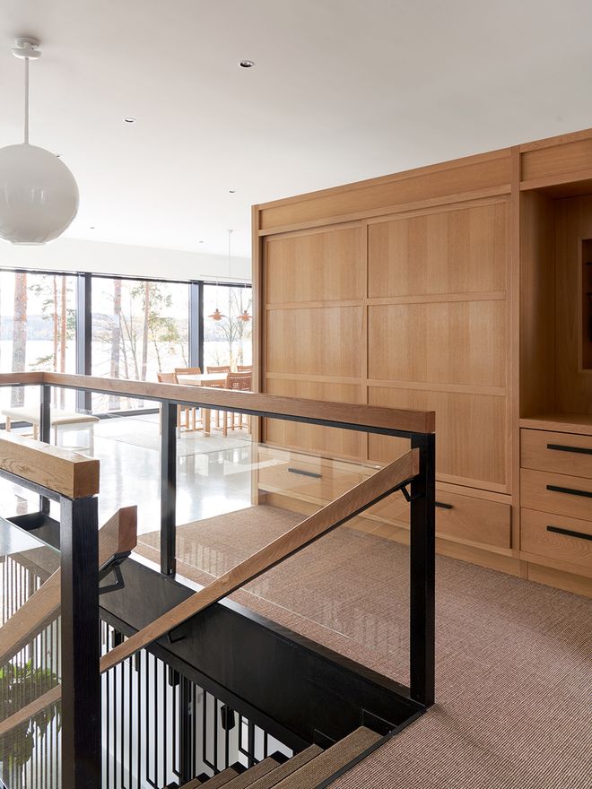 A spacious hallway and stairs leading downstairs