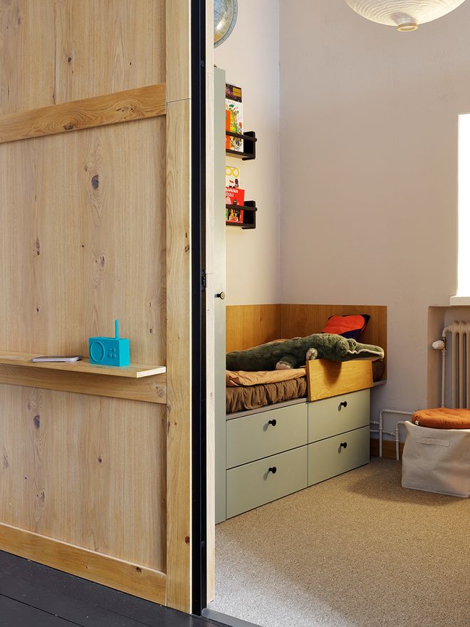 A children's bed made out of drawer units