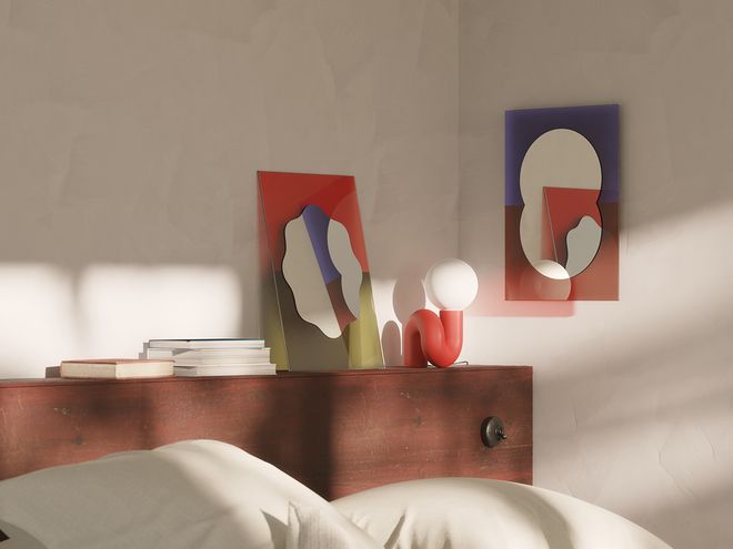 Two Wander mirrors in different colours