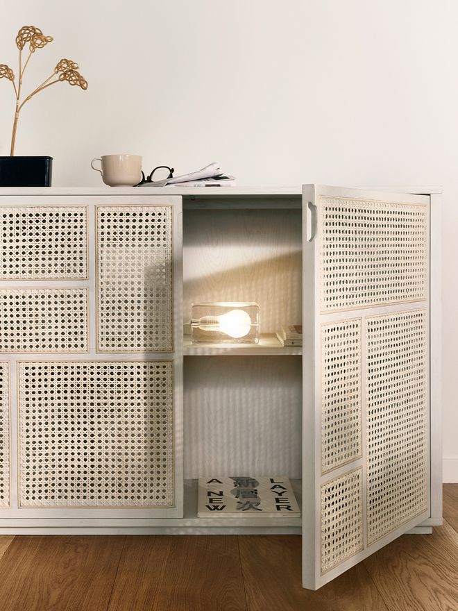 An image featuring Design House Stockholm's Block lamp as part of the living room decor.