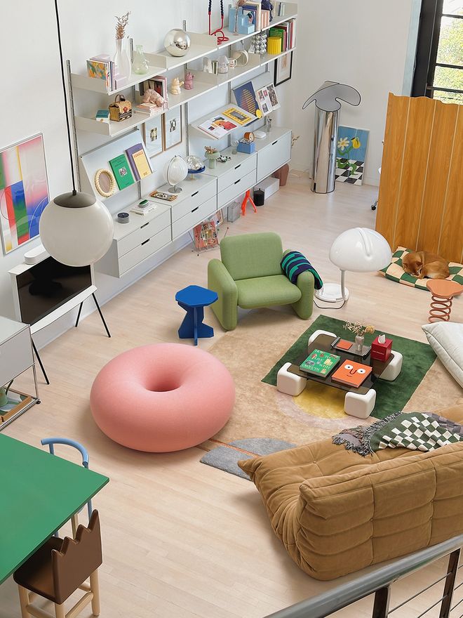 A view of a colorful living room full of design pieces.