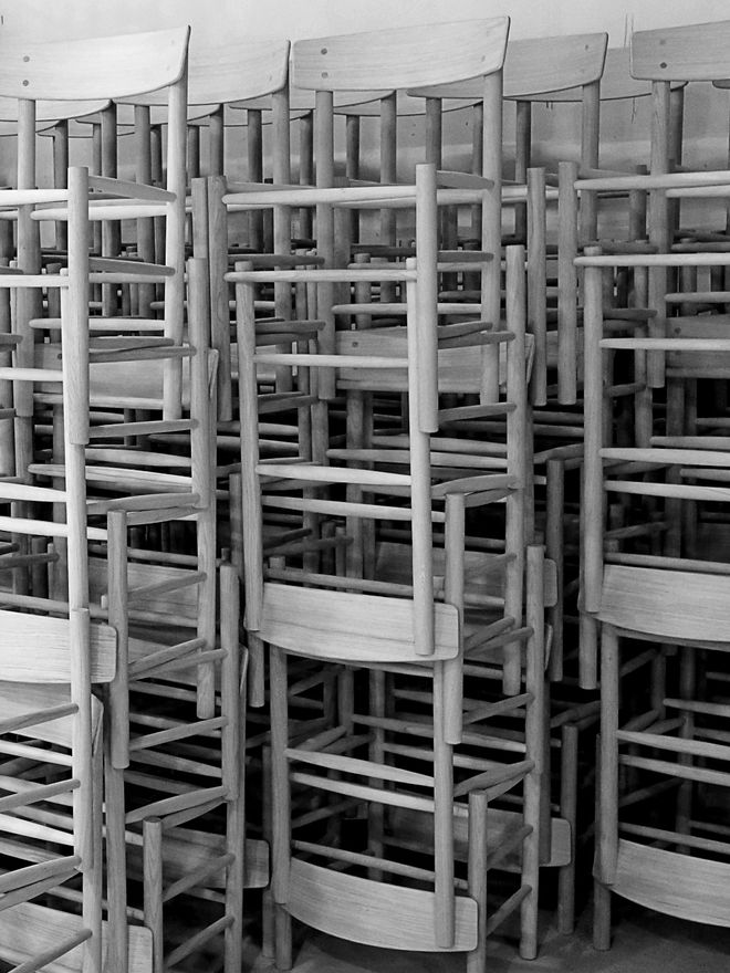 Black-and-white photo of creating of J39 chairs