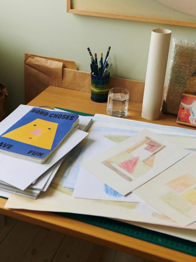 Papers and drawings on a desk