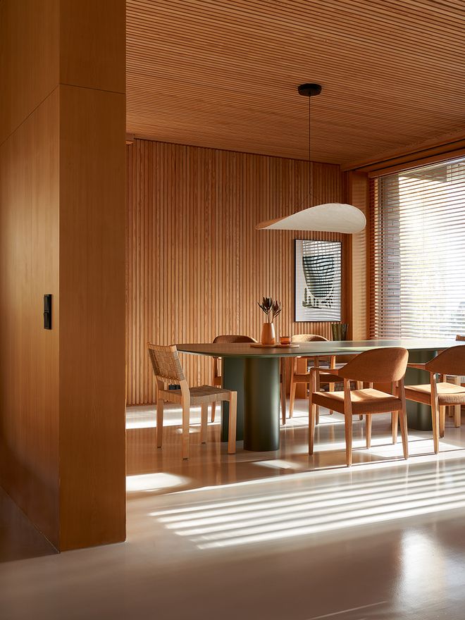 A dining room with a huge window