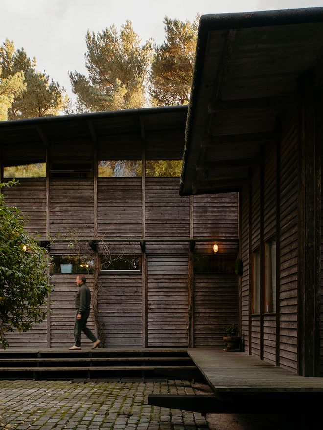 Peter Erlandsson walking on the terrace of his home