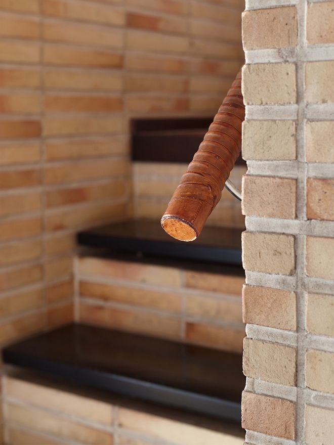 A detail of a leather-coated handrail