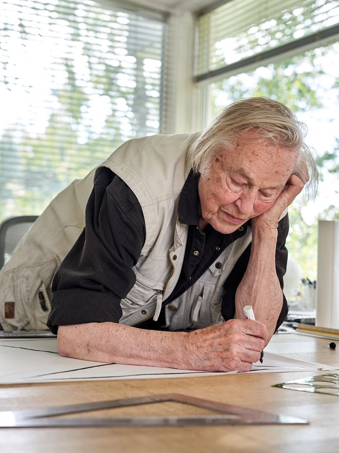 Eero Aarnio on his work desk