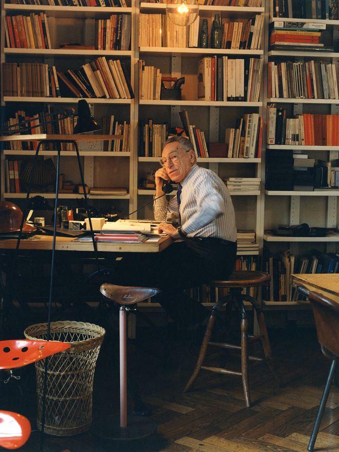 A portrait of Achille Castiglioni on his studio in Milan