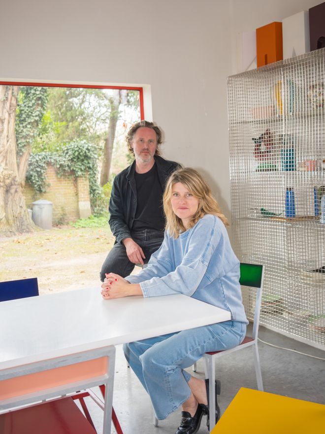 Hannes Van Severen and Fien Muller around a white table