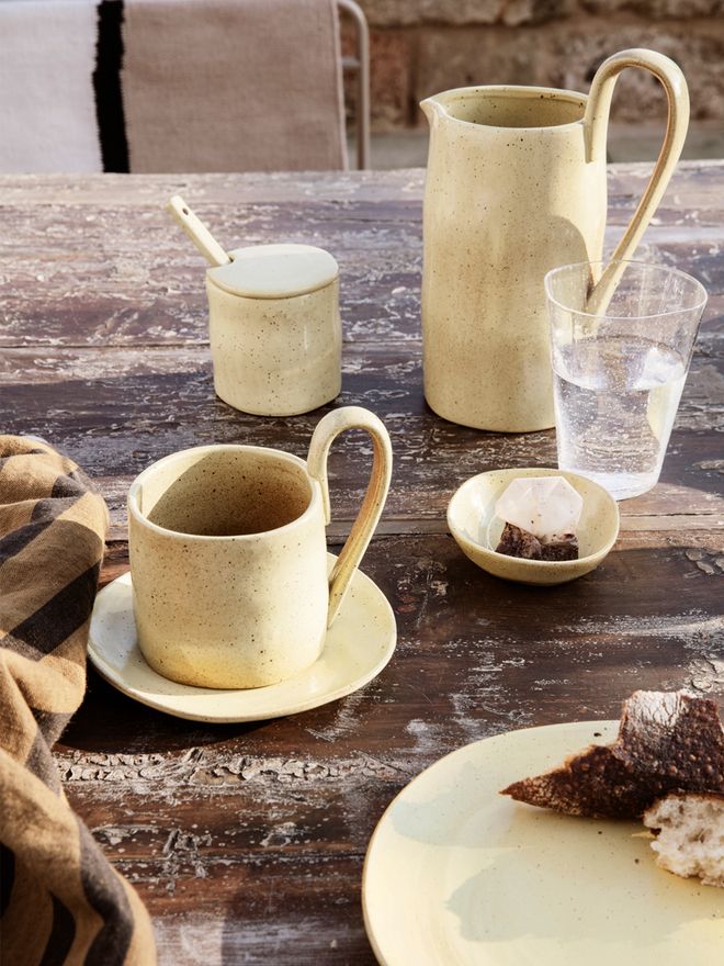 Ferm Living's Flow tableware on a table.