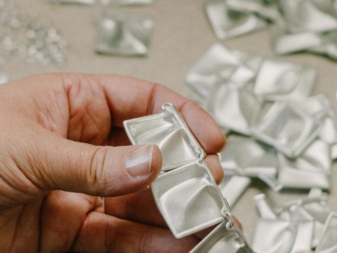 Kalevala Koru silver jewellery being crafted by hand.