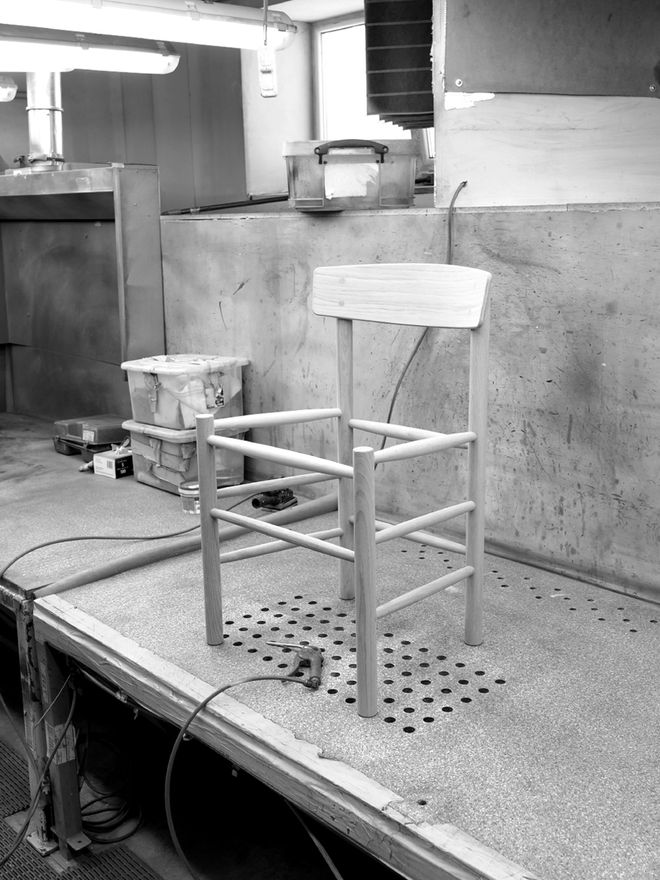 Black-and-white photo of creating of J39 chair