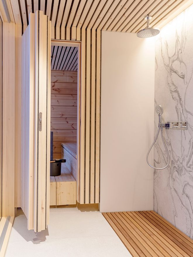 Open door to a sauna and a shower
