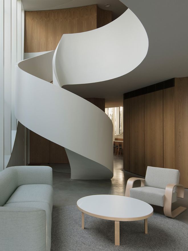 An image featuring Artek's Tank armchair and a low Aalto table as part of the interior.