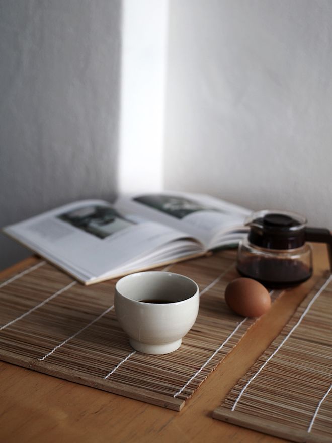 A cup of tea and a book an a table