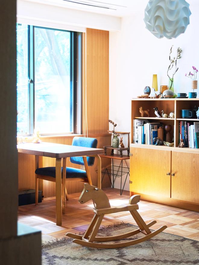 A rocking horse and a small home office desk