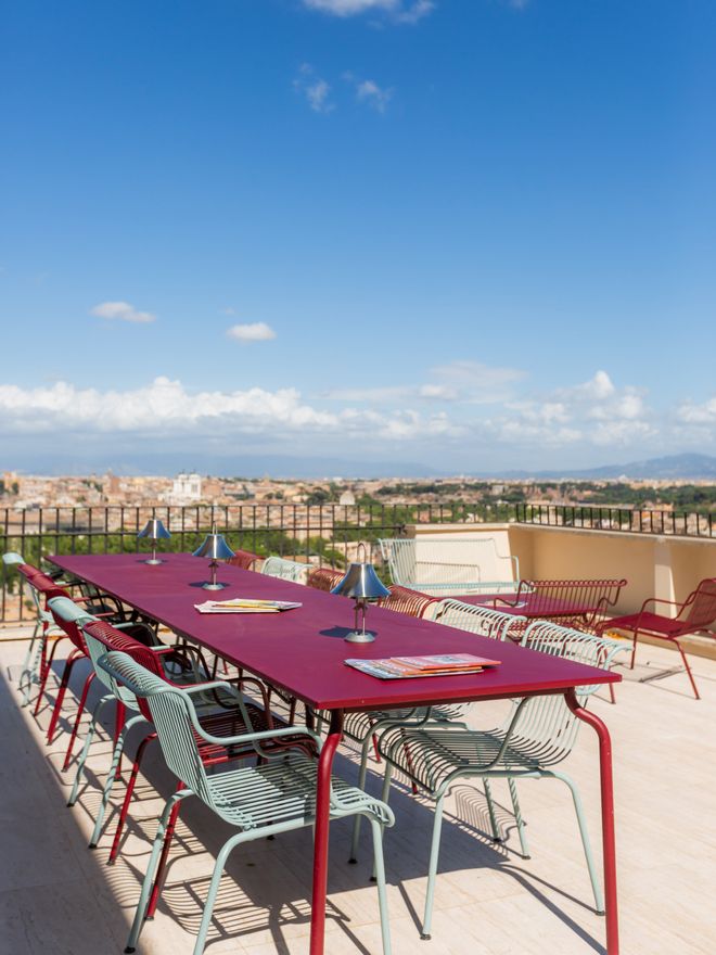 Red and green South outdoor furniture by Magis on the rooftop terrace