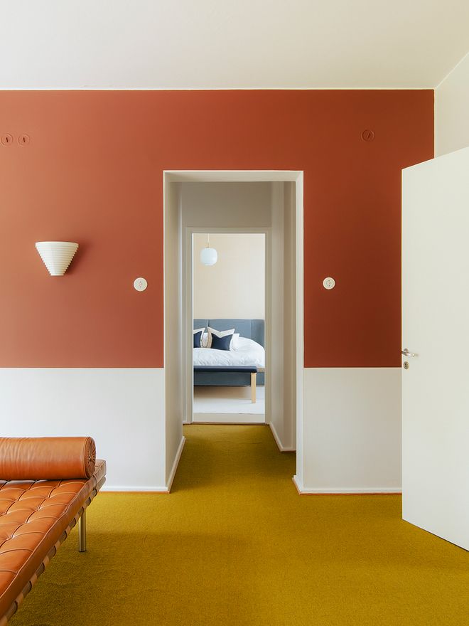 The original wall-to-wall carpet in the upper-floor hallway