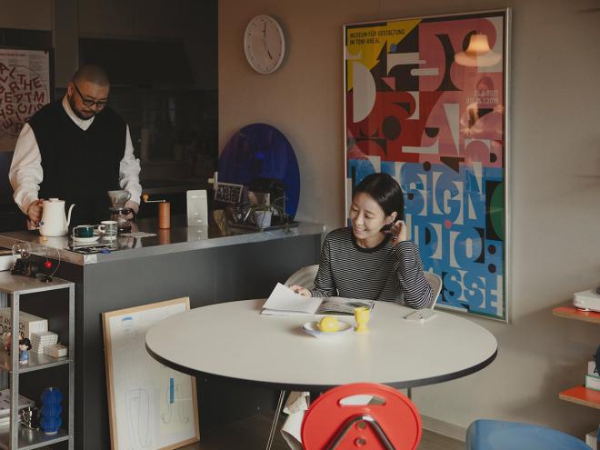 A South-Korean family taking a coffee break at home