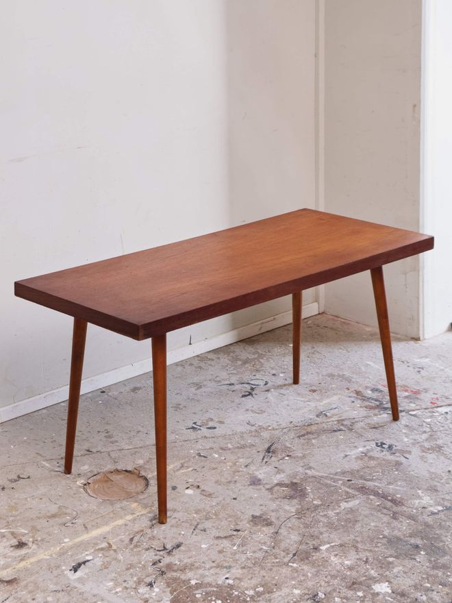 A refurbished teak coffee table