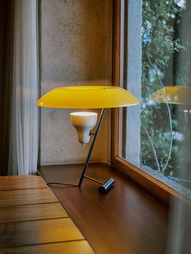 Astep Model 548 table lamp on a windowsill