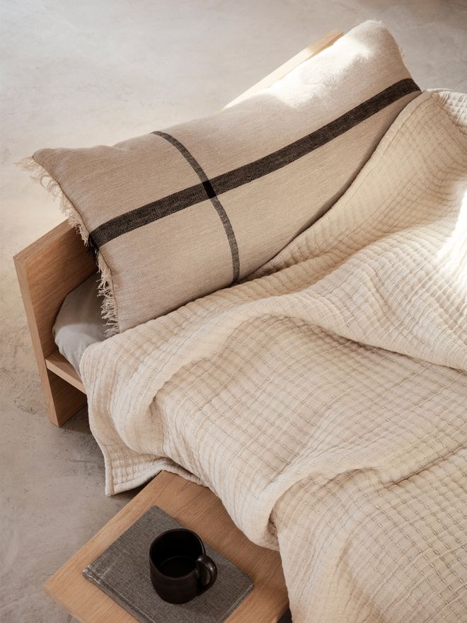 Ferm Living's Calm cushion is bedroom decor.