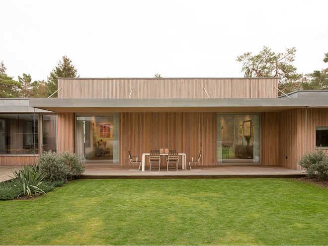 An image of Villa MSV, a private home located in Sweden. The image features the façade and the terrace of Villa MSV.