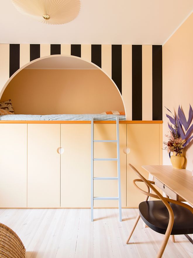 A bed on top of a cabinet