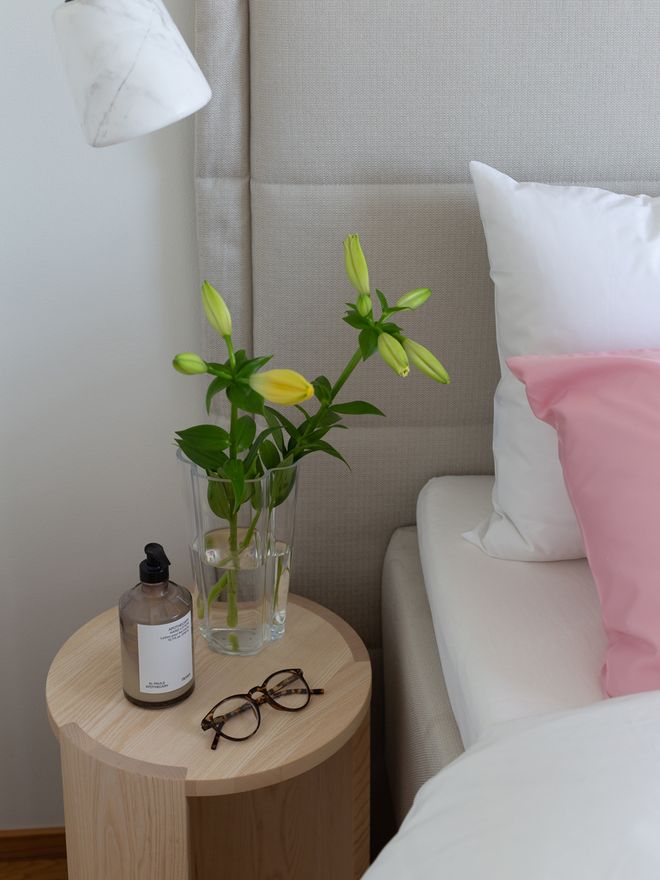 A wooden bedside table