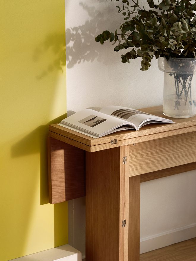 An image featuring Design House Stockholm's Flip table as part of the living room decor.