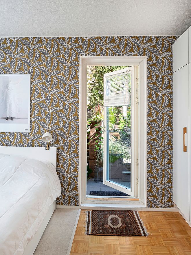 A door to the patio from the bedroom