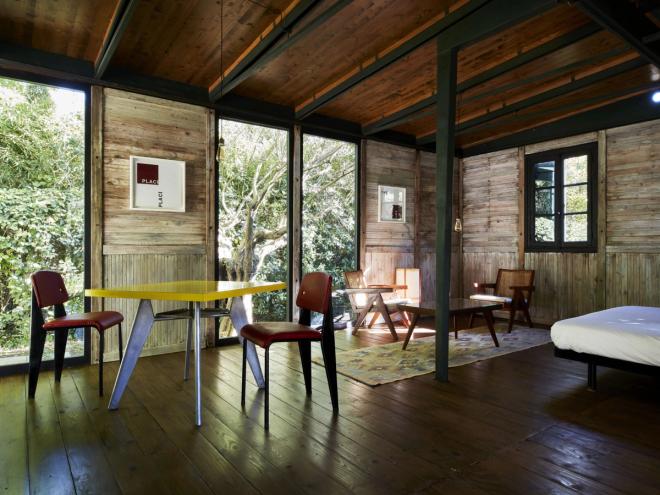 A demountable wooden house designed by Jean Prouvé in the garden of Fondation CAB