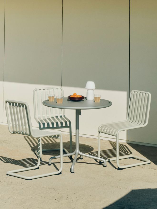 Garden furniture on the sunlit terrace
