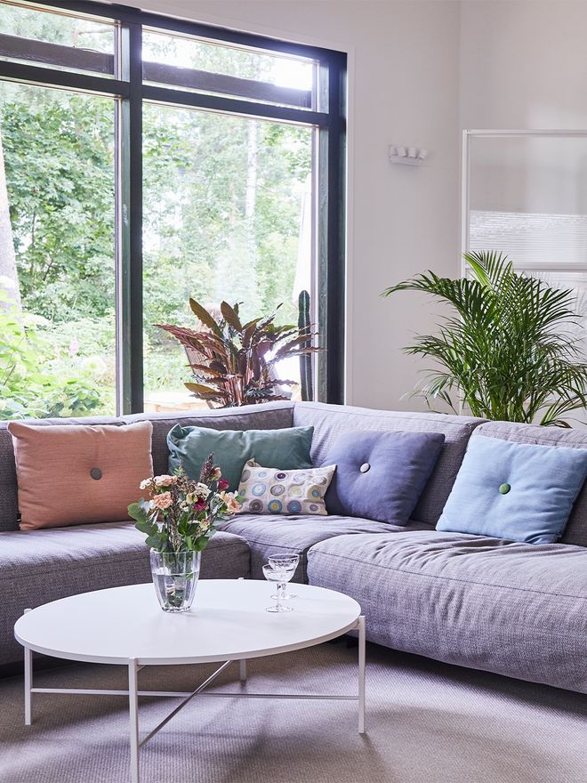 Dot cushions by HAY on the sofa