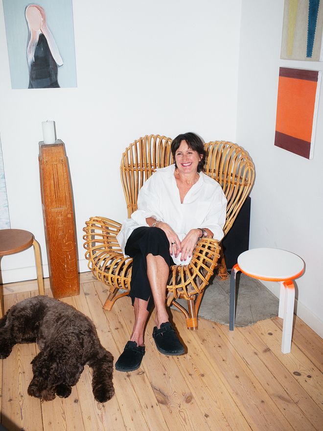 Anna Vartiainen sitting in a chair