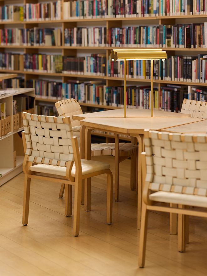 A detail of the furniture and lighting in the library of the Nordic House