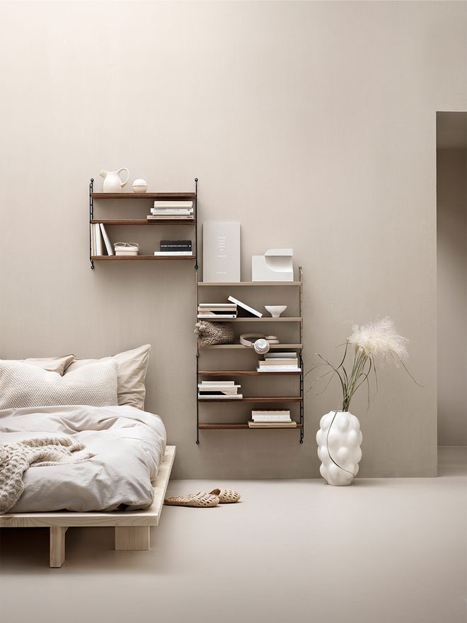 String Pocket shelves in a bedroom.