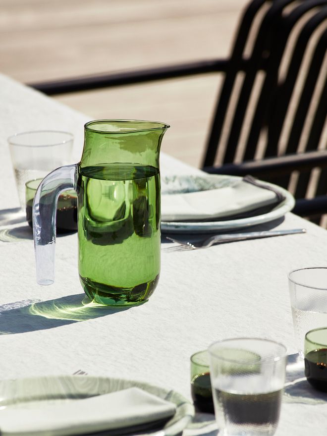 Hay's green glass jug with a lilac handle