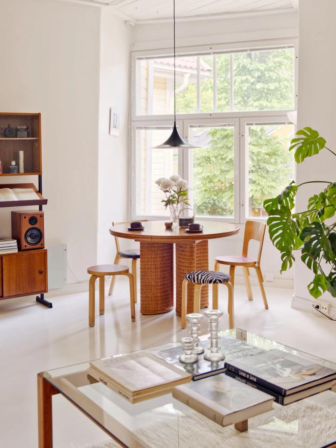 Artek chairs around a vintage table