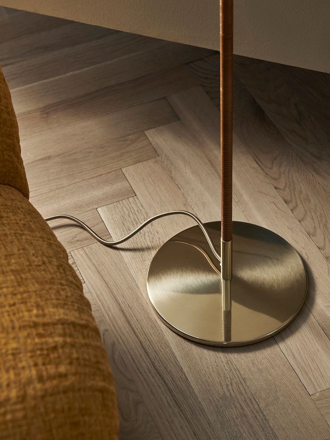An image featuring GUBI's Paavo Tynell's 9602 floor lamp.