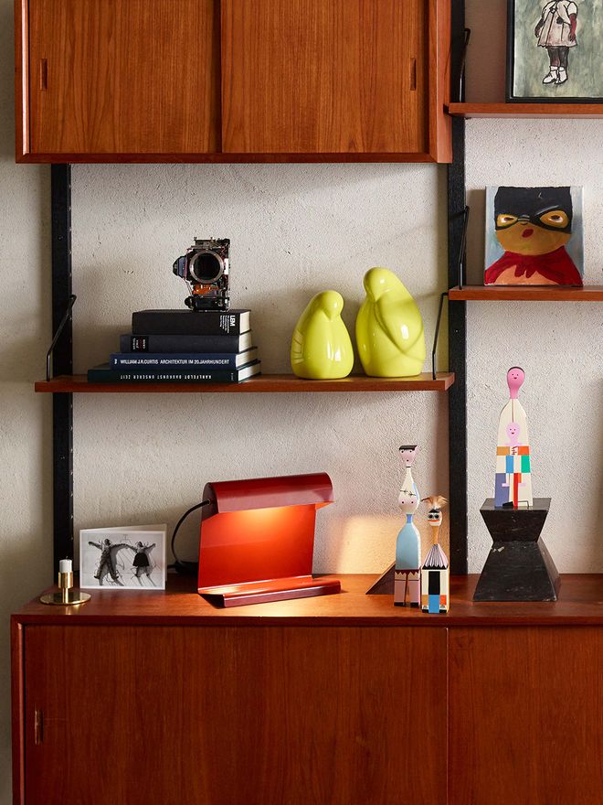 Vitra's Lamp de Bureau lamp in red, designed by Jean Prouvé.