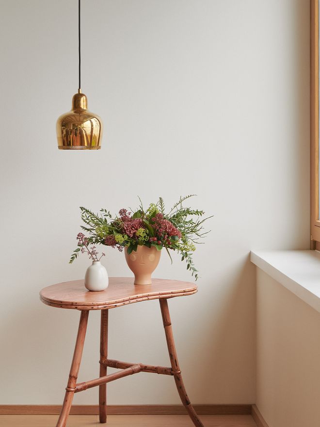 An image featuring Artek's A330S pendant or Golden Bell as part of the interior.