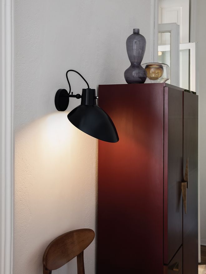 An image featuring Astep's VV Cinquanta wall lamp as part of the hallway interior.