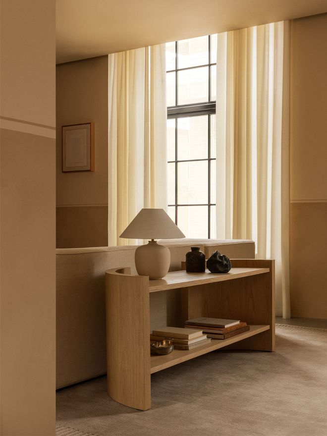 Audo Copenhagen's Torso table lamp and Crescent bookshelf