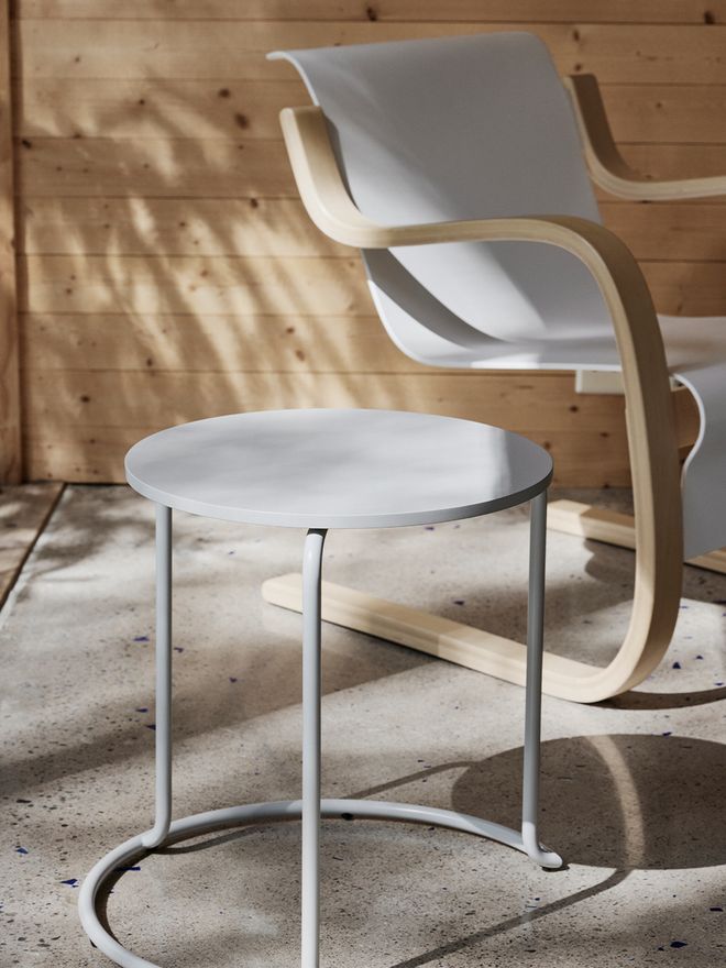 An image featuring Artekin Aalto Armchair 42 and 606 side table as part of the living room decor