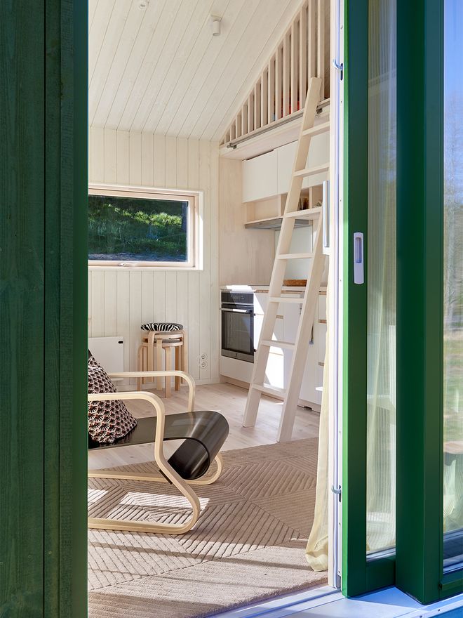 An image of Sommarnöjen's Sommar 30 miniature house, which is a part of the Architect's House exhibition: the living room decor.